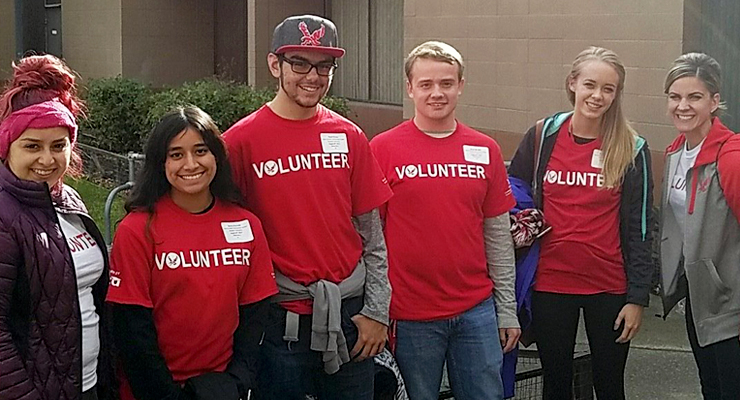 Photo: Community service students wearing volunteer shirts