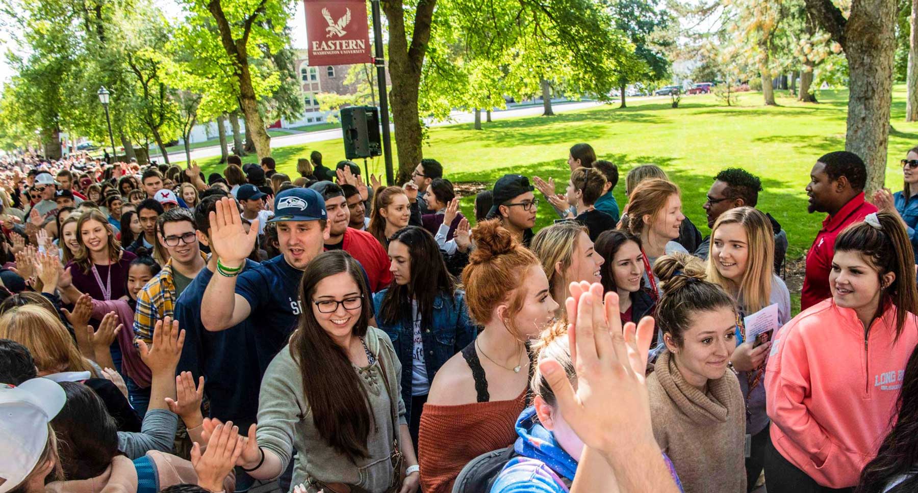 Students pass through the pillars