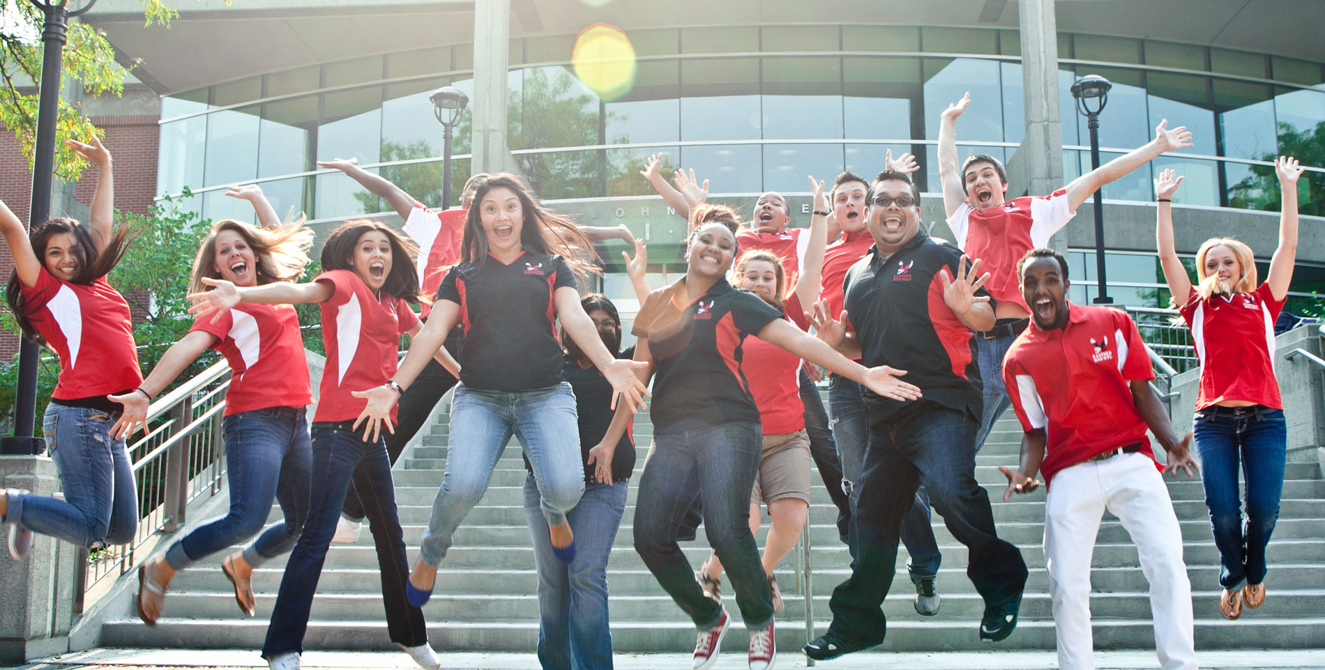 Photo: EWU Students celebrating in front of JFK Library