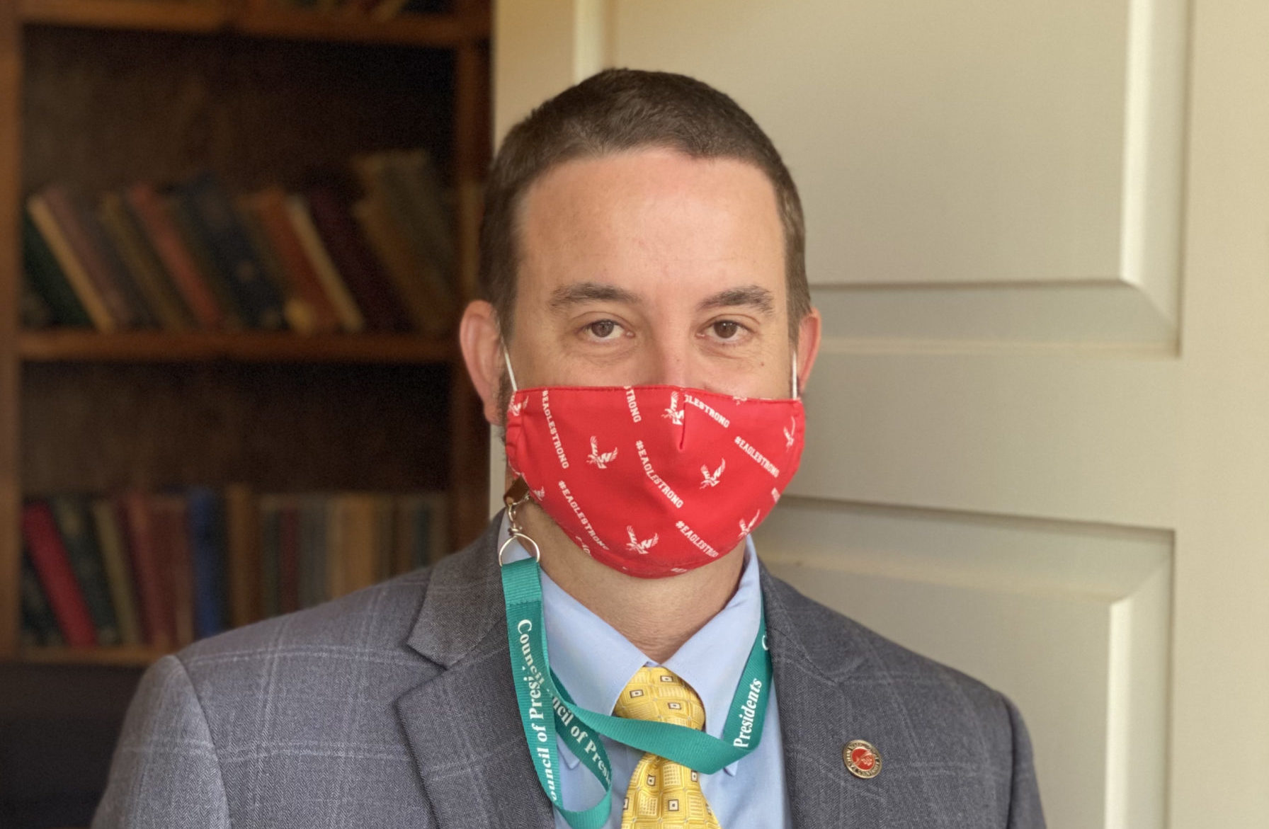 Interim President May with a cloth #eaglestrong mask